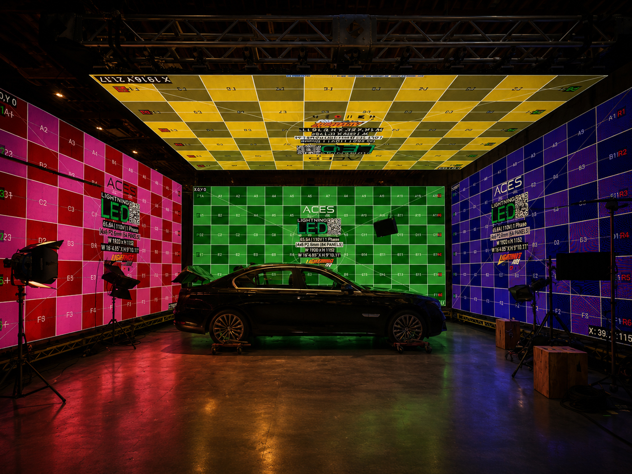 Car process setup surrounded by green LED panels.